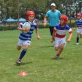 Photos of little children playing rugby